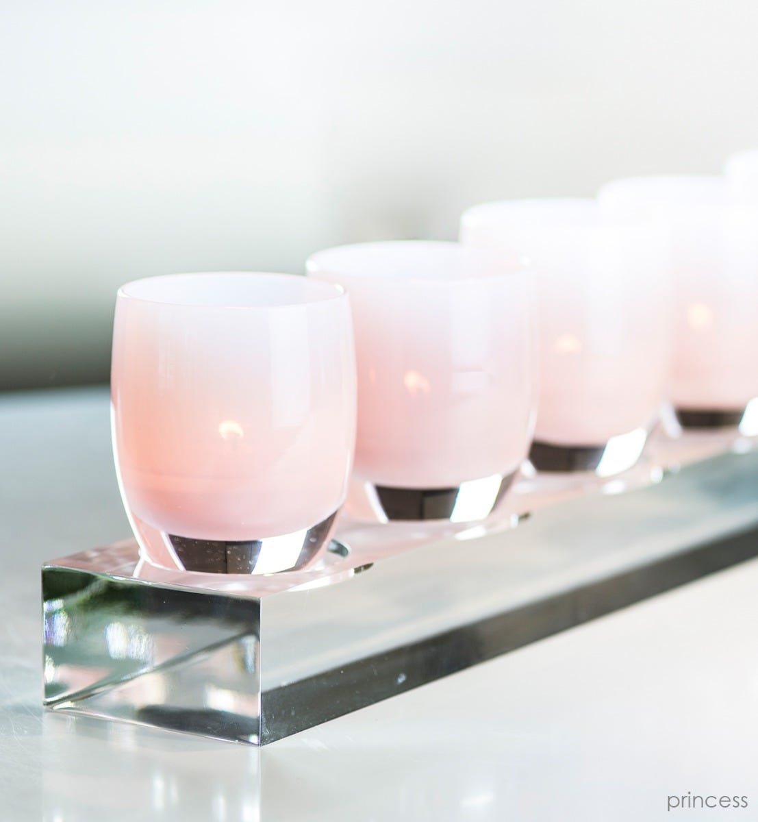 princess soft pink hand-blown glass votive candle holder, on five well baby stand.