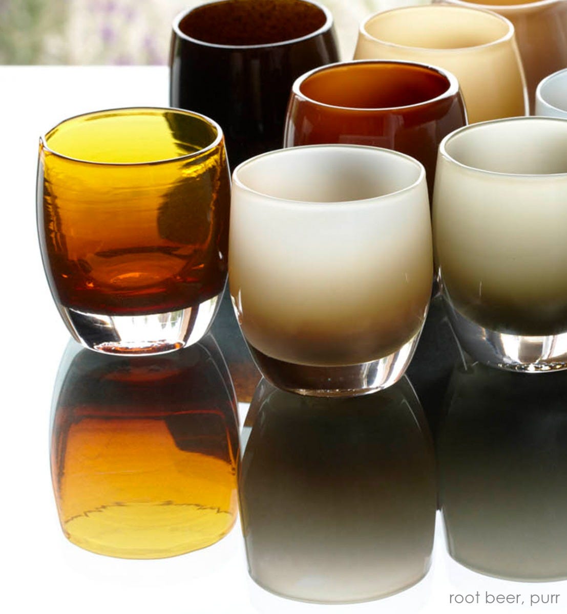 purr tan shaded hand-blown glass votive candle holder. Paired with rootbeer.