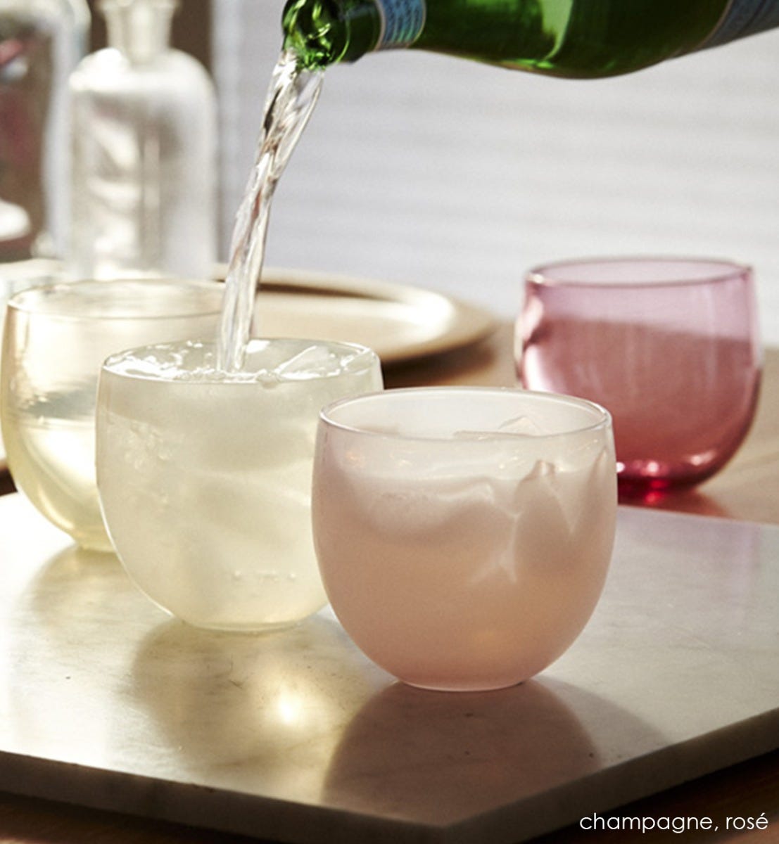 rose drinker, soft pink hand-blown drinking glass. Paired with champagne. 