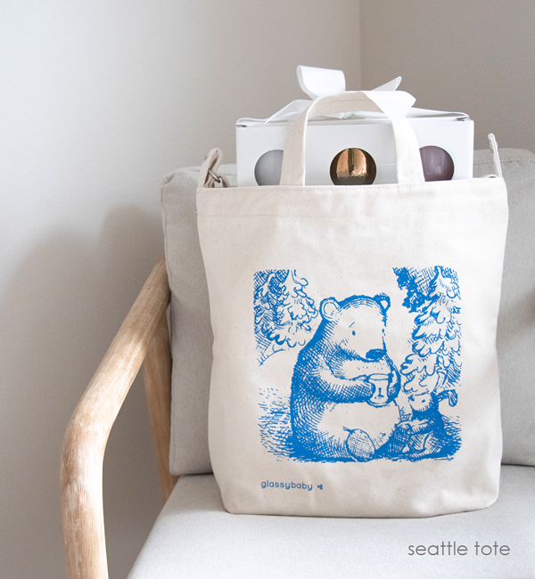 blue bear holding glassybaby, "crafted in seattle" canvas tote