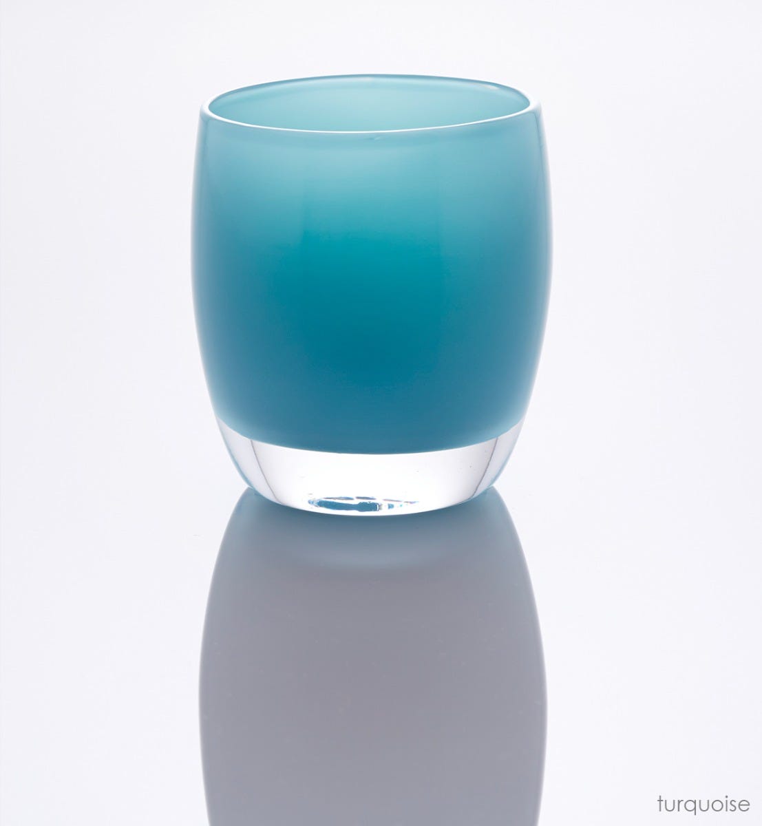 hand-blown turquoise glass votive candle holder