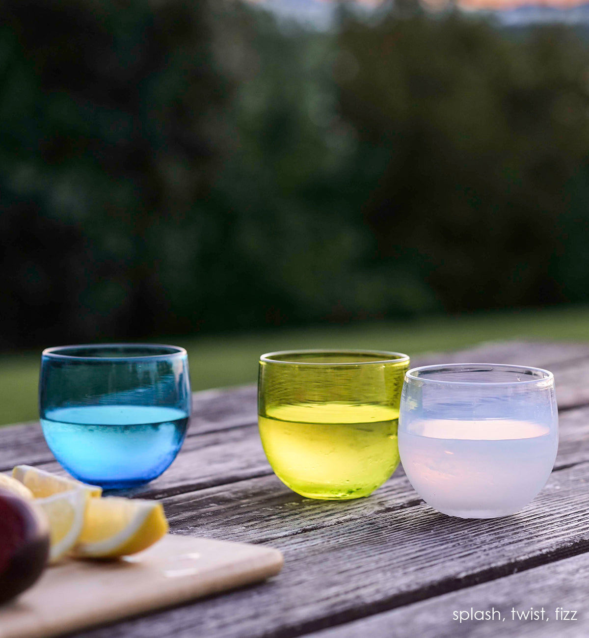 twist drinker, transparent lime green, hand-blown drinking glass. Paired with splash and fizz.