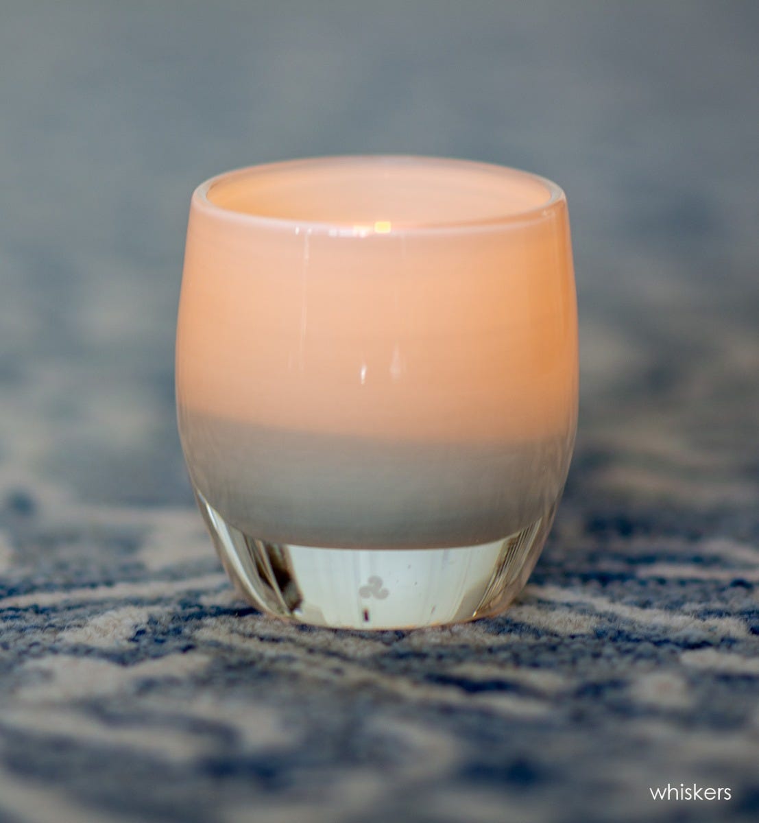 whiskers, opaque pale white, hand-blown glass votive candle holder.